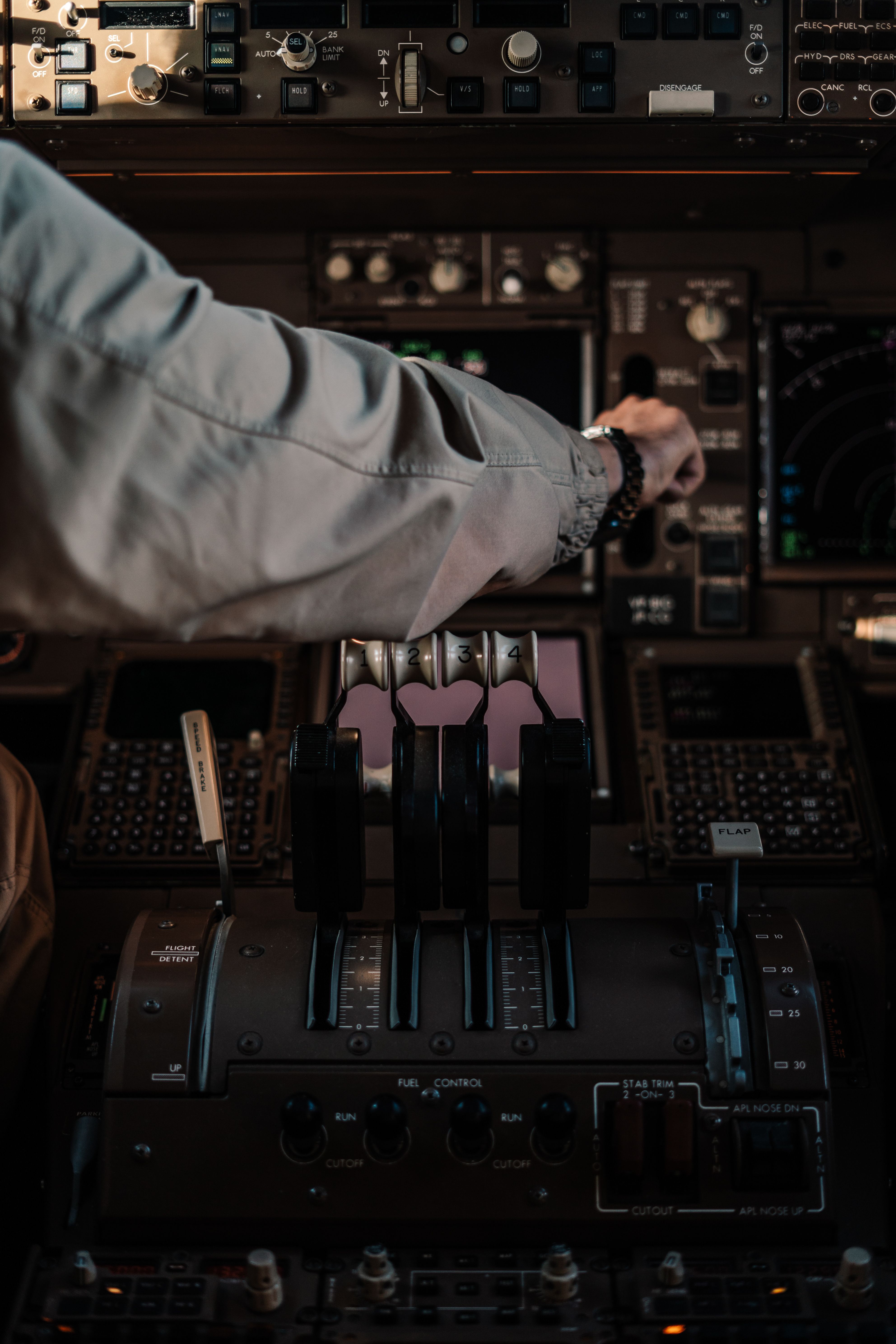 Aircraft cockpit controls at dusk